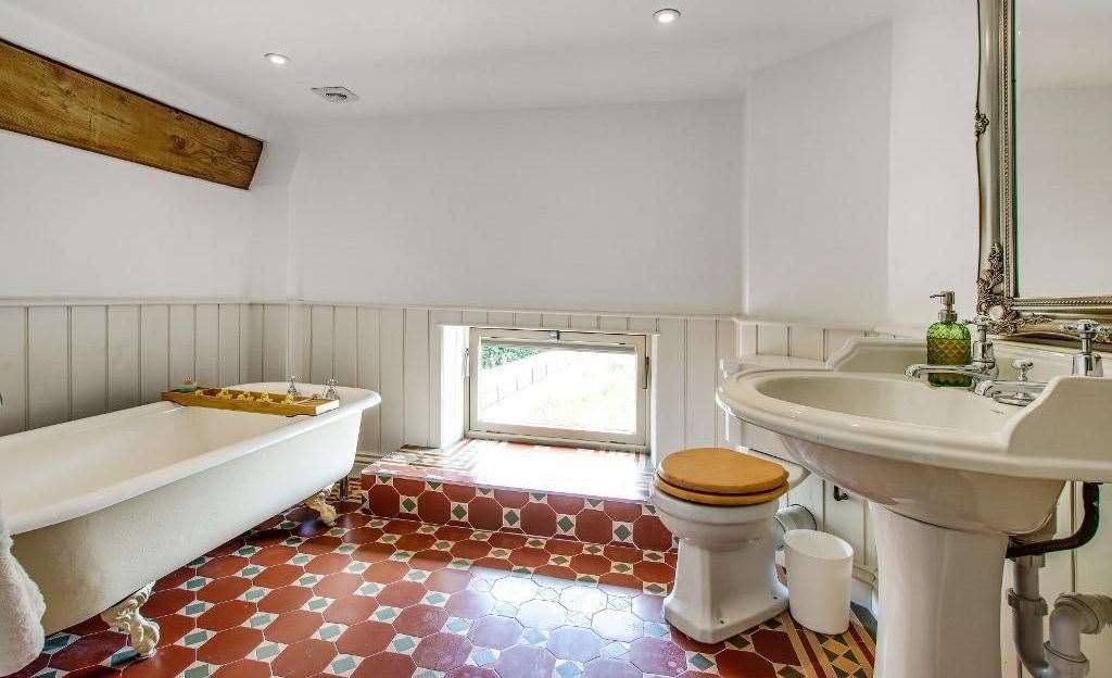 The house has family bathrooms, shower rooms and an en suite off the master bedroom. Picture: Harpers and Hurlingham