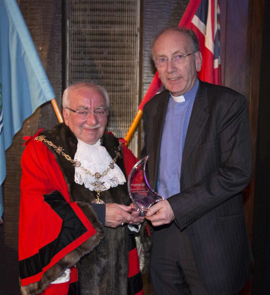 Chris Stone was presented with an award by former mayor Harold Craske. (2101926)
