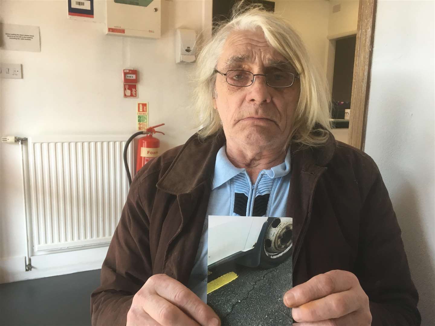 David Brown says council contractors painted yellow lines around his parked van before giving him parking tickets