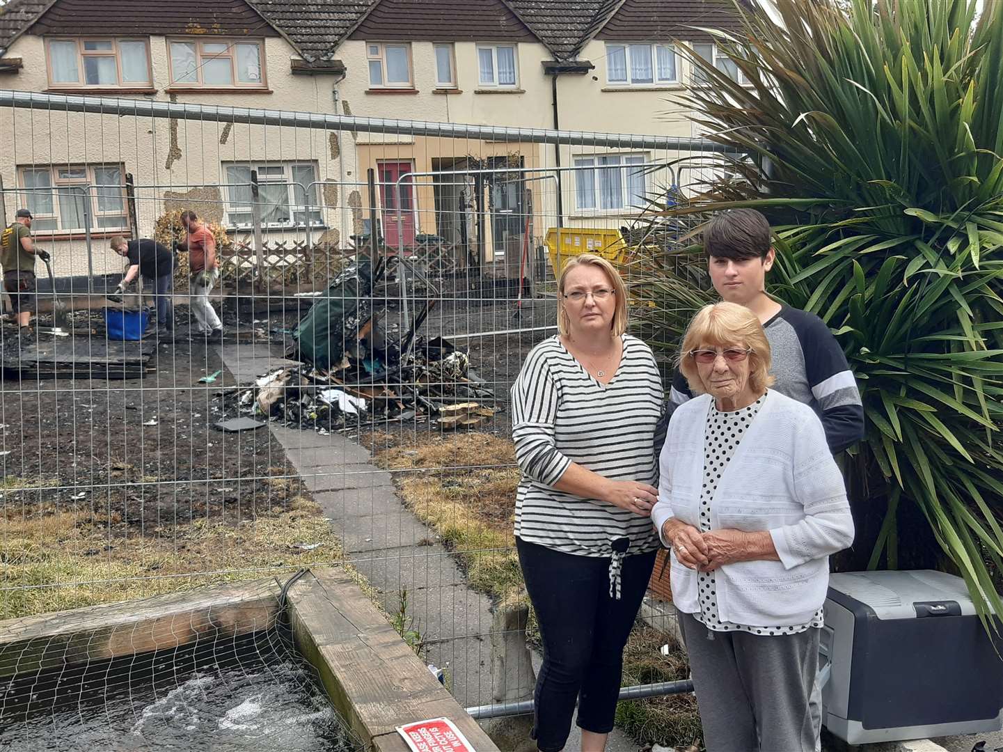 Doris Short, 91, pictured with daughter-in-law Kim, and grandson Luke after her mobile home went up in flames in Hill Rise, Darenth