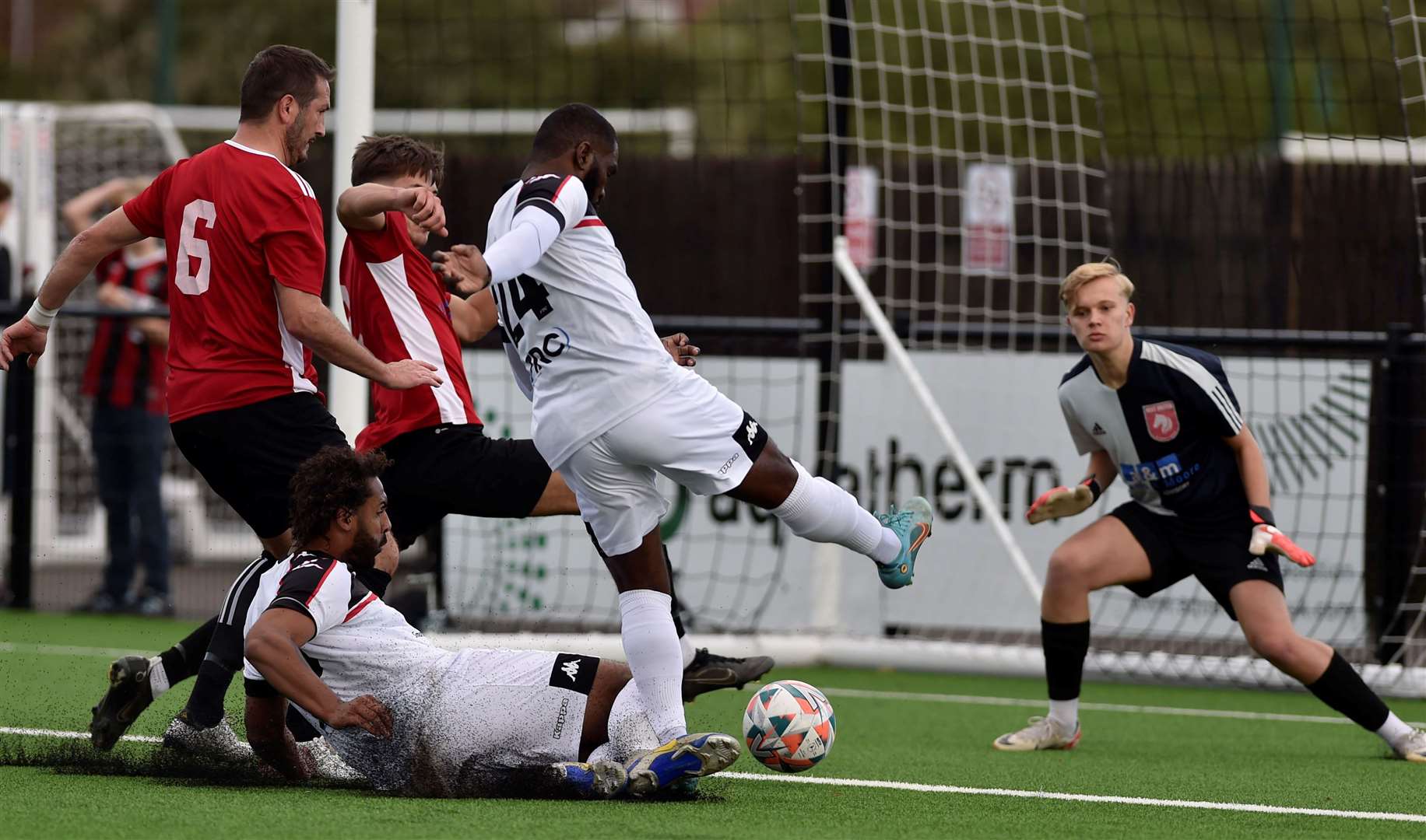 Warren Mfula turns the ball home to put Faversham ahead against Kent United. Picture: Ian Scammell