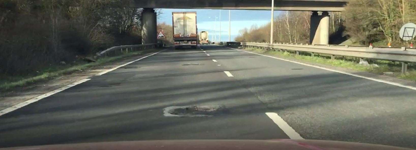 On footage taken from his dashcam, Mr Magill counted a dozen potholes along a short stretch of the A2