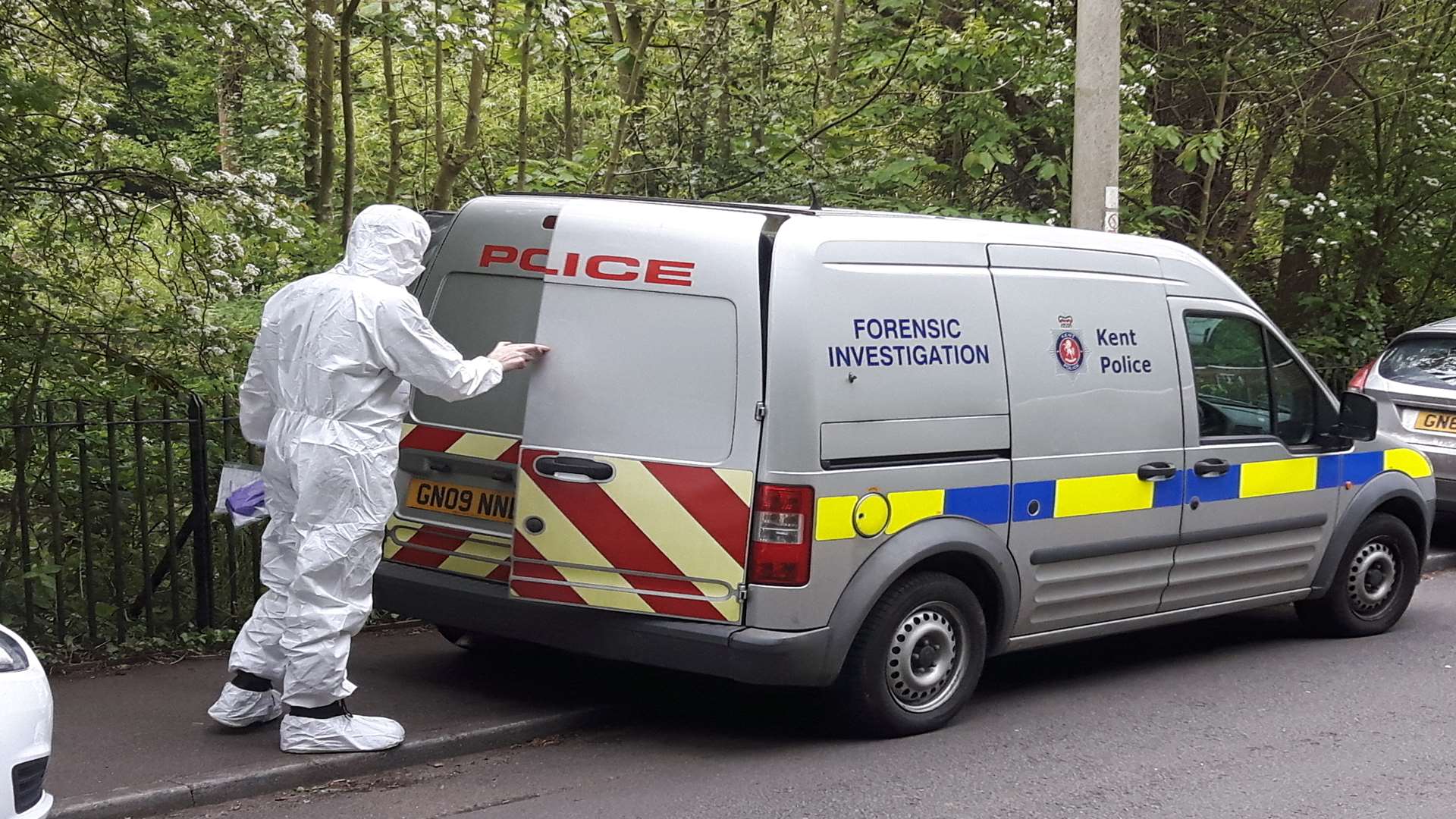 A police forensic officer at the scene on Sunday moring