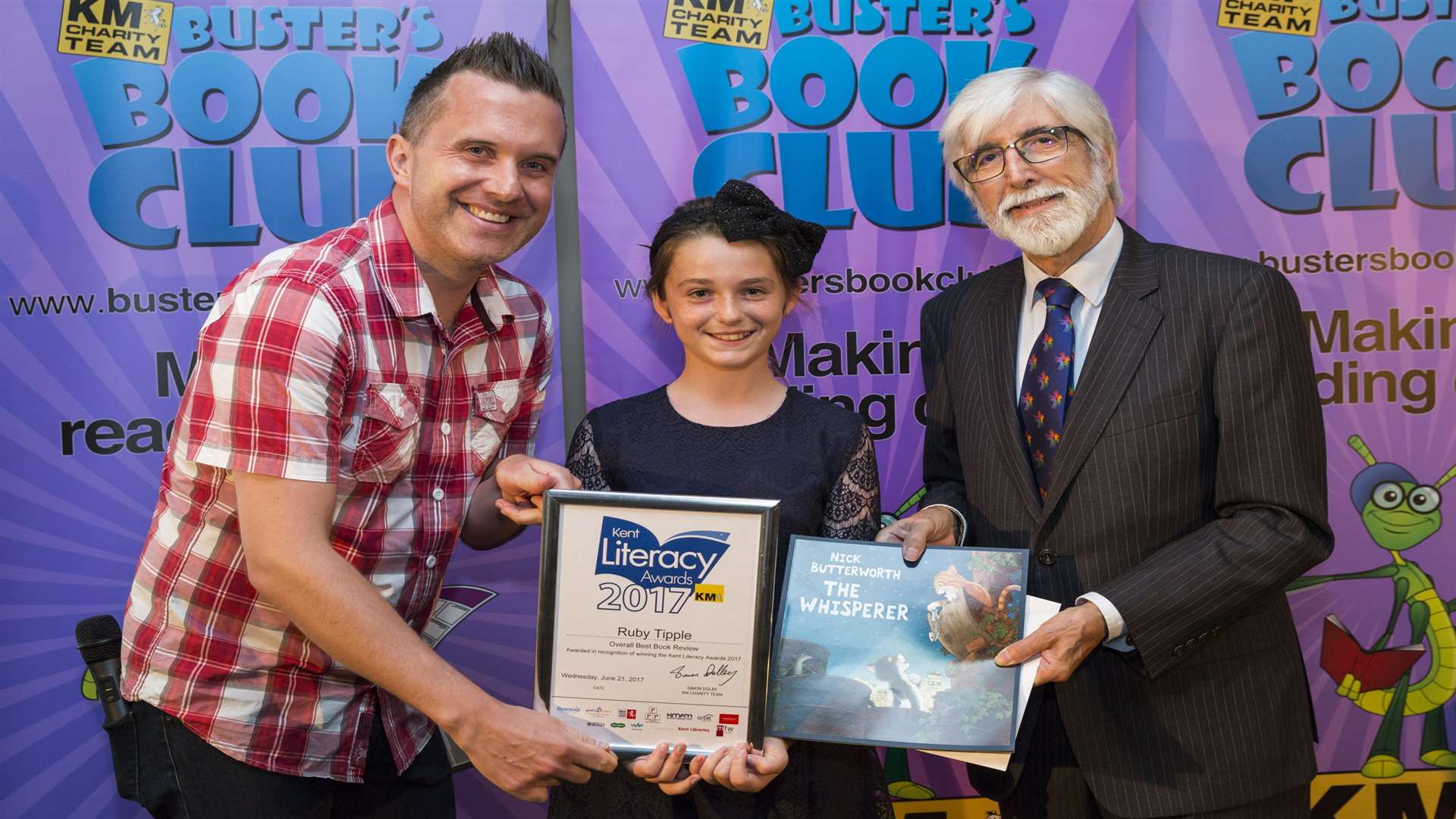 CBeebies' Phil Gallagher and Patrick Thomas of Cornwallis Charity present Best Child Book Reviewer of the Year Ruby Tipple of Cliftonville Primary School with her prizes.