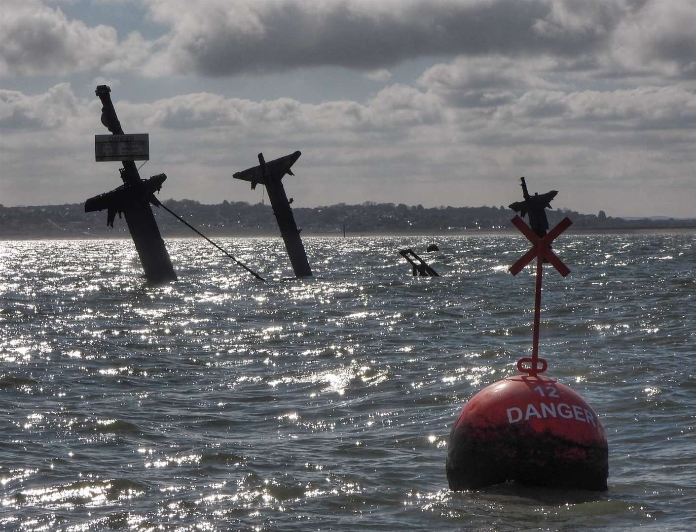 Masts and buoy of the Richard Montgomery bomb ship off the coast of Sheerness. Picture: Margaret Flo McEwan