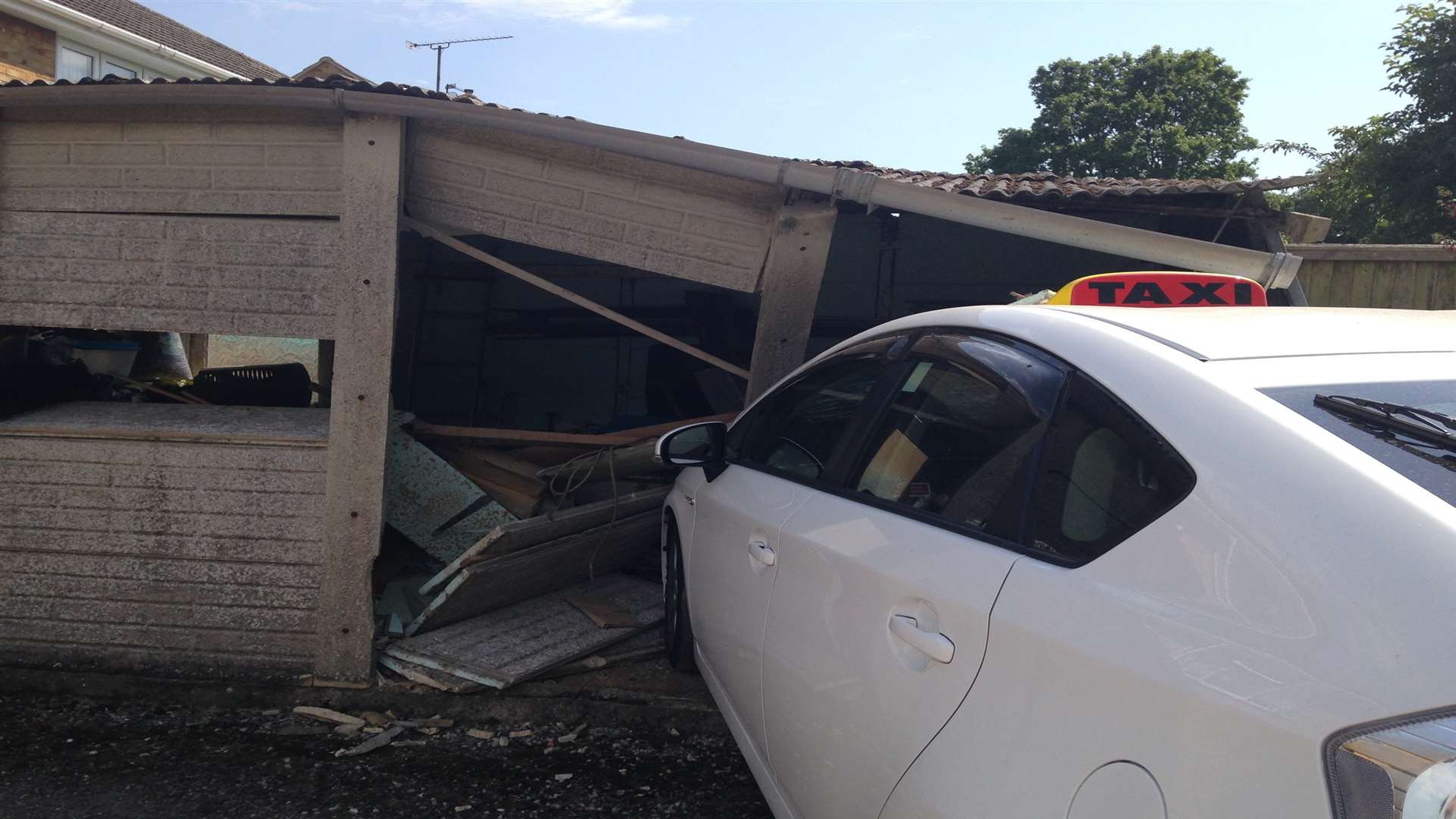 The taxi which crashed into the garage in Sussex Drive, in Chatham