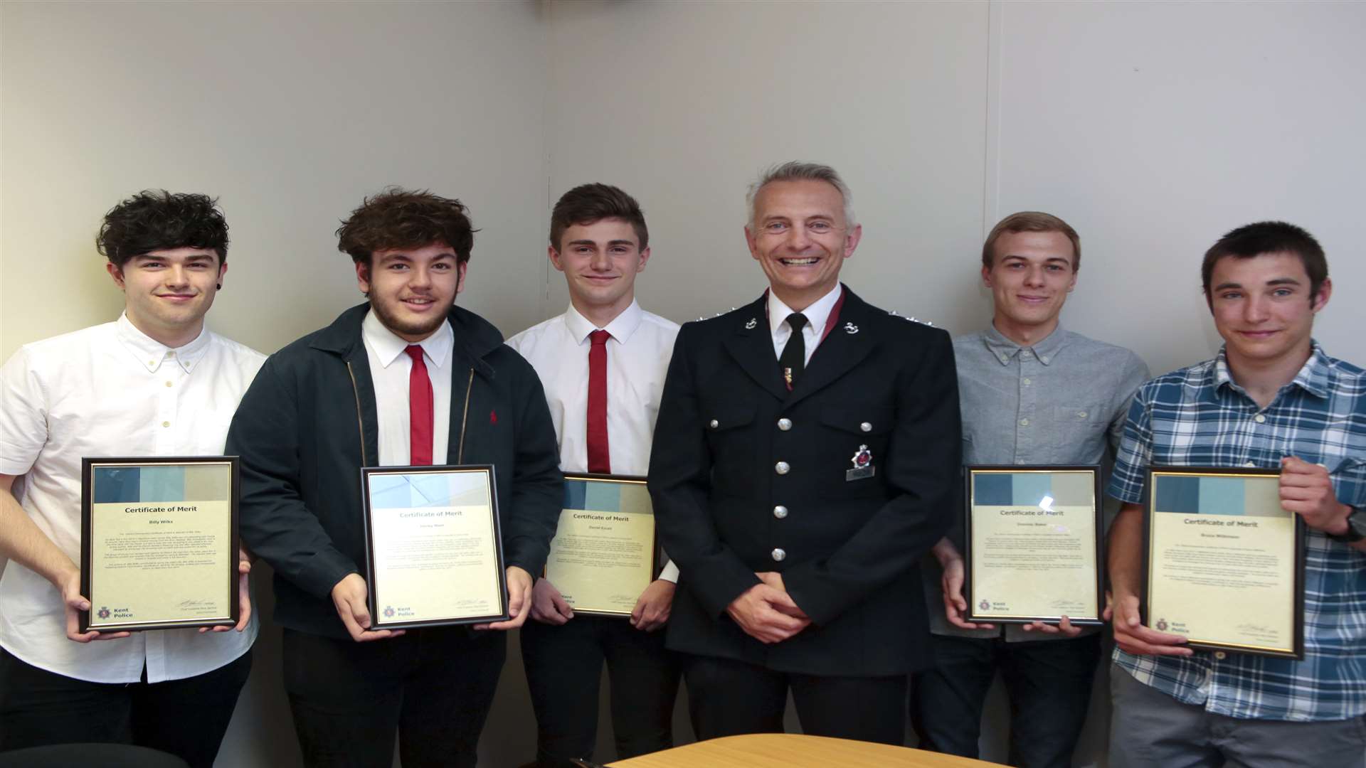 The young heroes: Billy Wilks, Harkley West, Daniel Excell, Dominic Baker and Bruce Wilkinson with Chief Inspector Mick Gardner