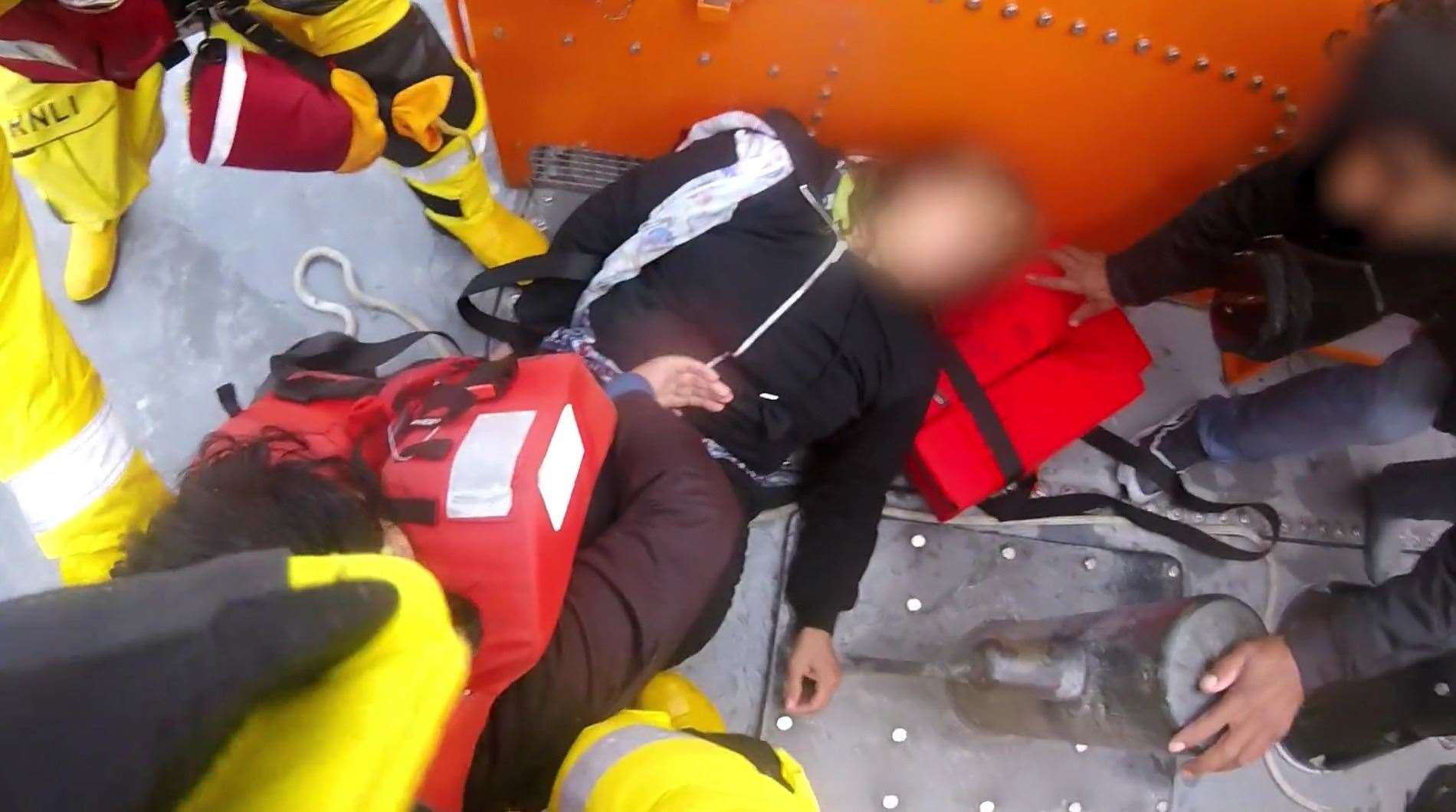 A person is brought aboard the Dover RNLI lifeboat. Picture: RNLI