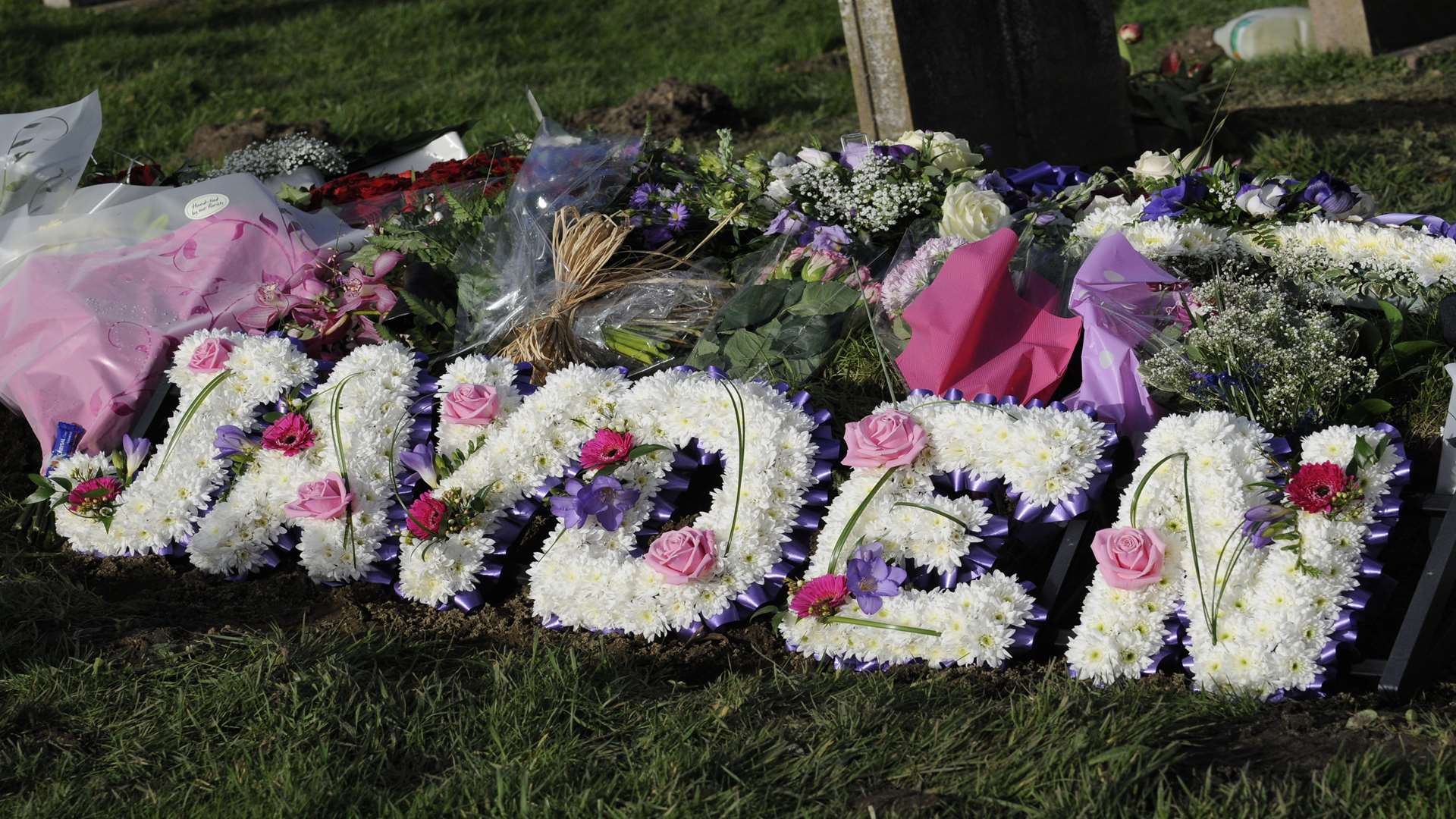 Flowers placed at the grave of Jayden Parkinson at St Martin's Church in Cheriton