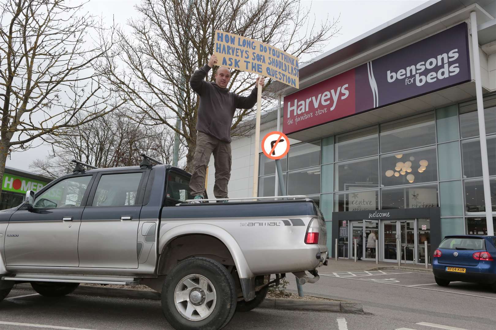 Ian Hayden, from Paddock Wood, staged a protest outside Harveys in Aylesford retail park. Picture by Martin Apps.