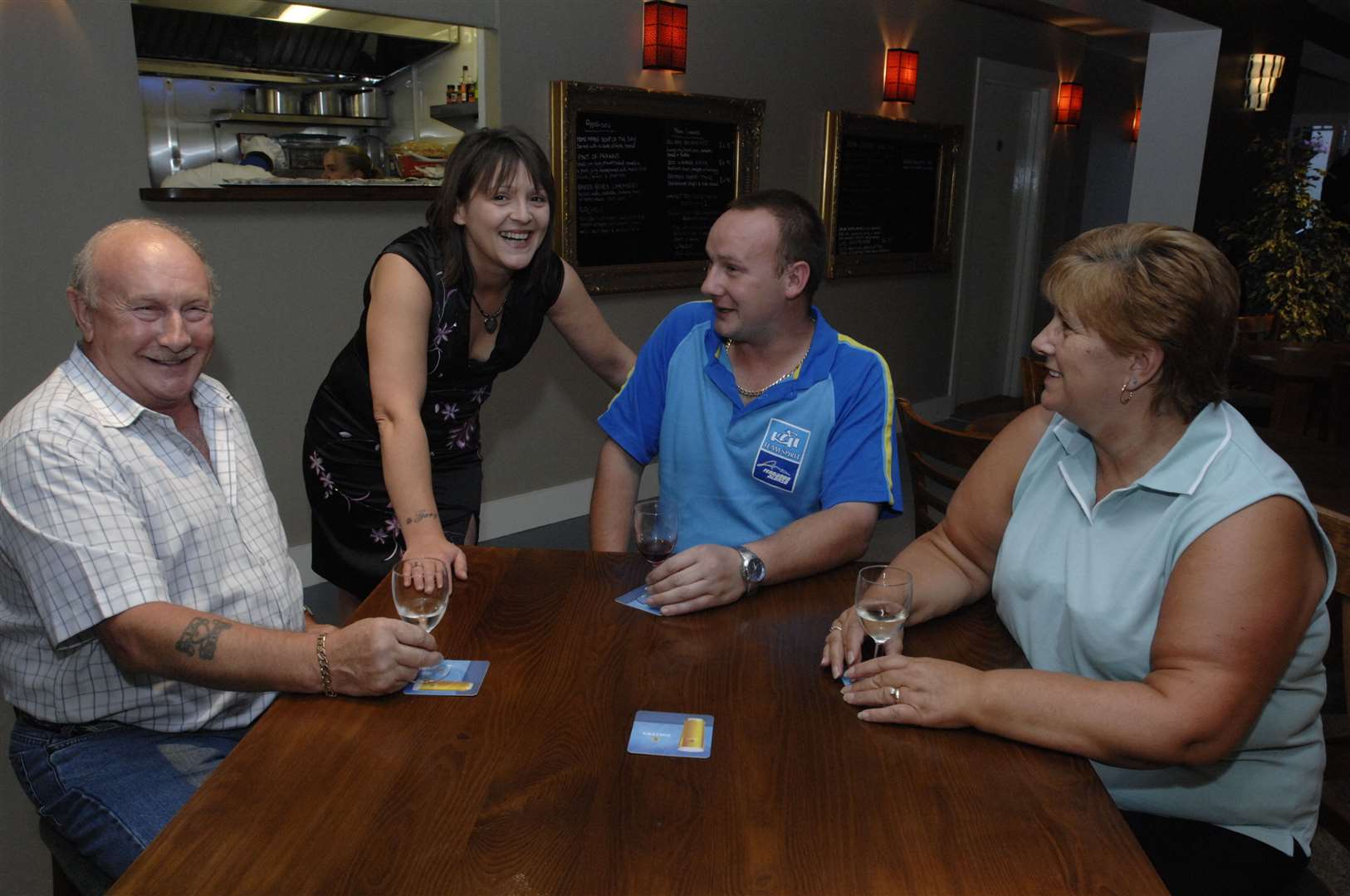 Former Three Cups landlady Maggie Mellor talks to guests at a launch evening after the pub was refurbished in 2007