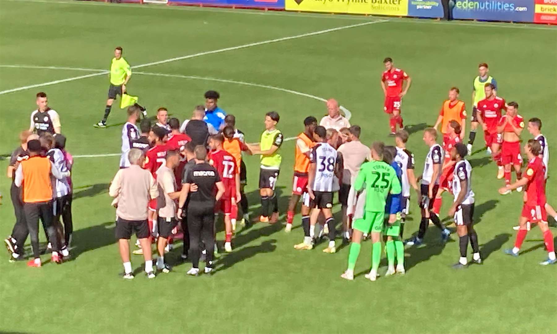 Gillingham assistant David Livermore was booked by the referee after the final whistle