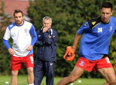 Peter Taylor watches over his squad in training last season Picture: Barry Goodwin