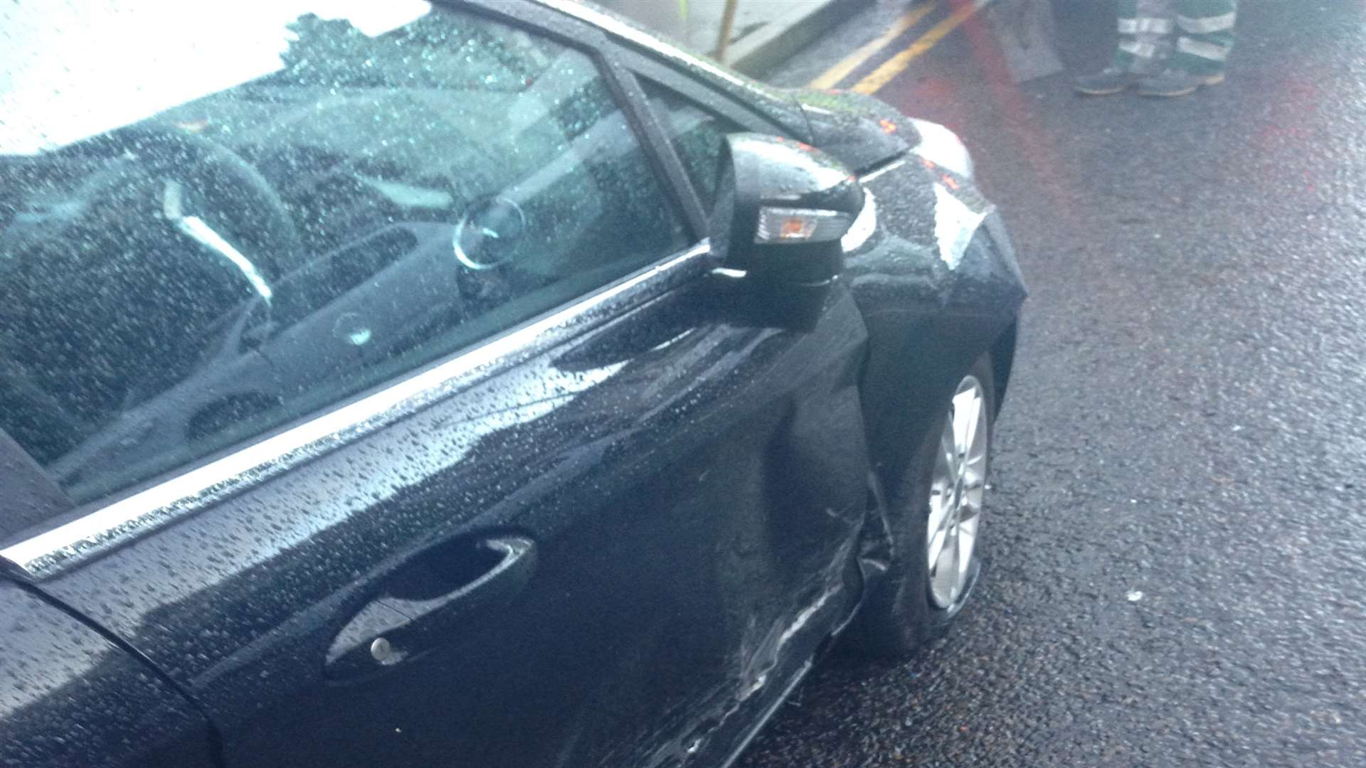 The black Ford Fiesta which was hit in Sheerness High Street.