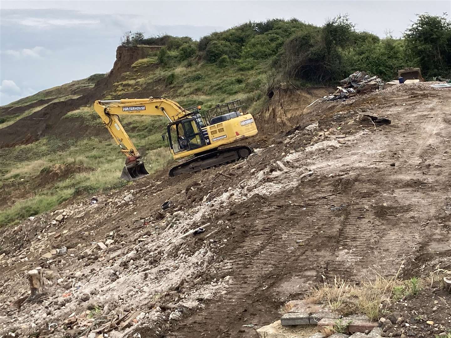 A digger working on the cliffs at Surf Crescent, Eastchurch, Sheppey. Picture: John Nurden