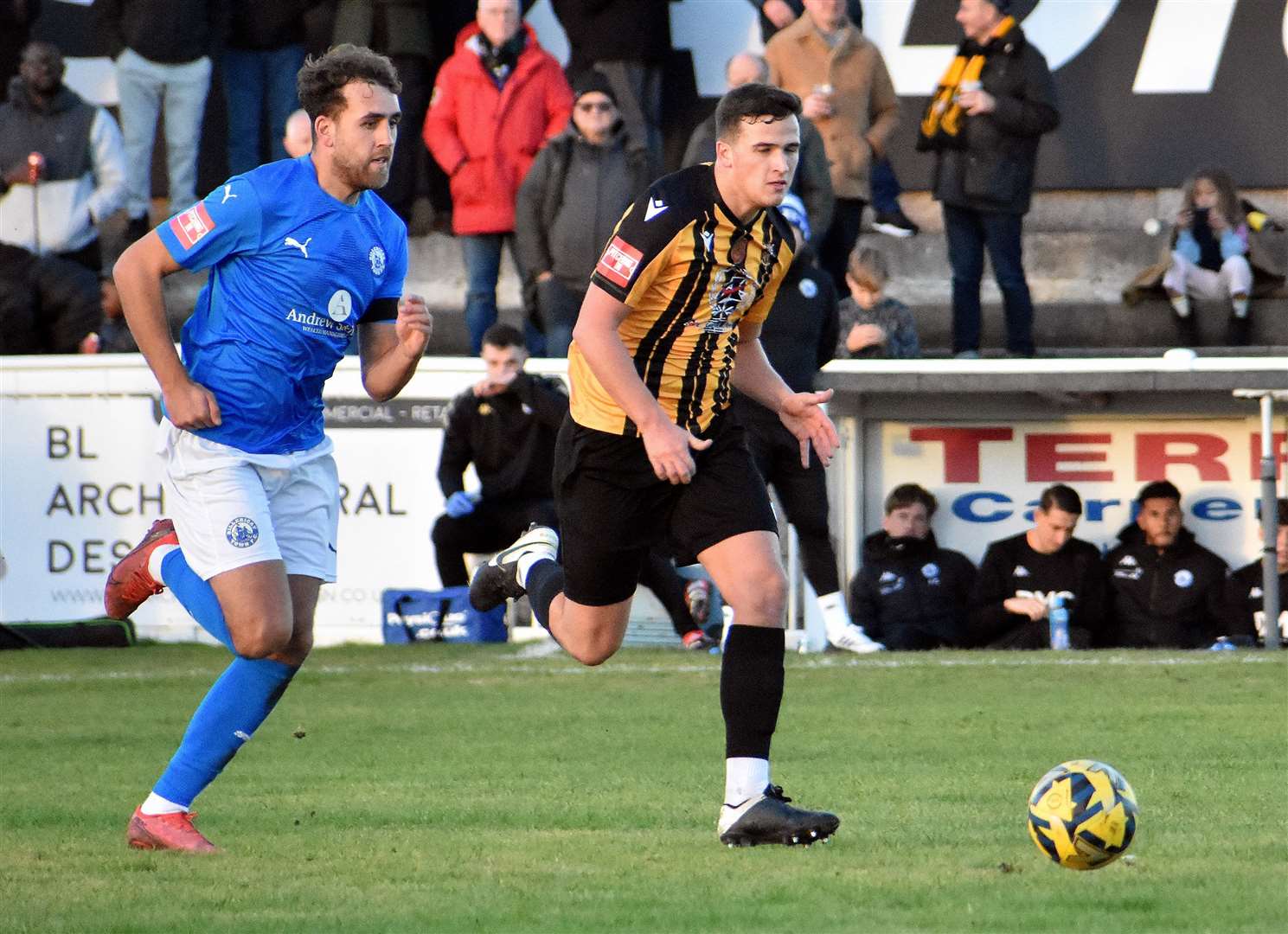 Folkestone and Billericay in a sprint for the ball Picture: Randolph File