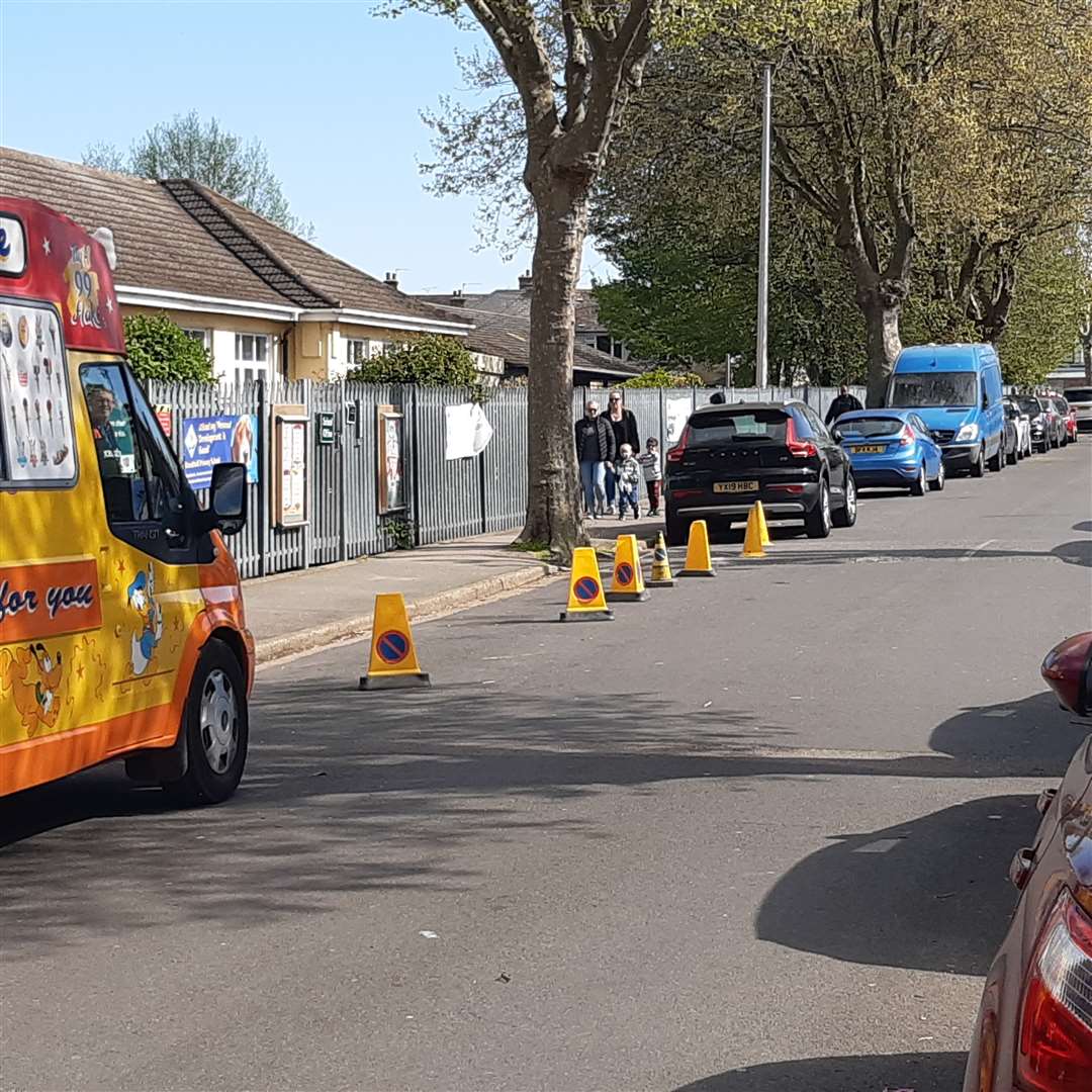 An area has been coned off outside Knockhall Primary School to prevent parents parking in a space reserved for mini-bus drop-offs. Photo: Sean Delaney