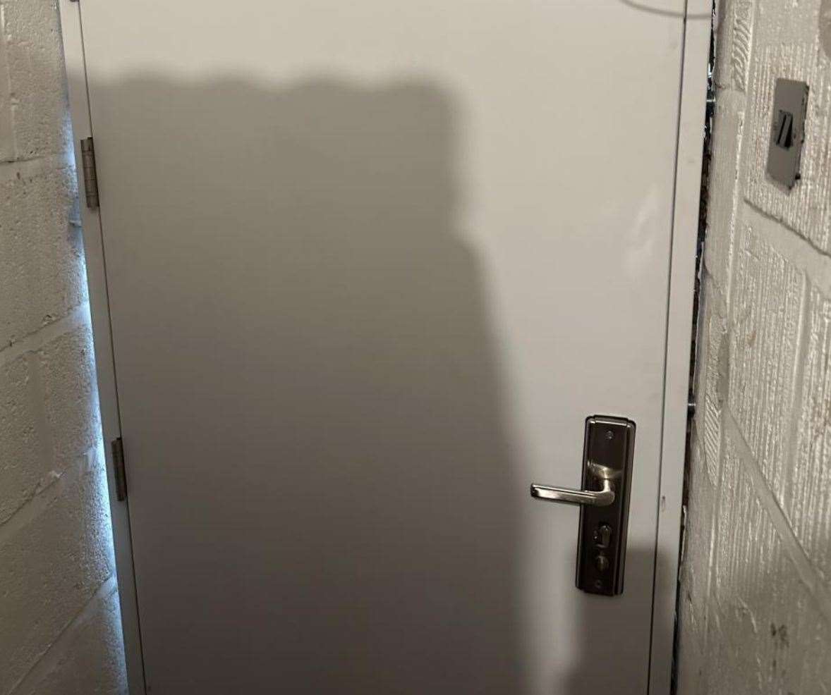 Inspectors said this door at Premier Bavishna Convenience Store in Ashford has not been 'pest-proofed' but Mr Puvanachandran insists that is has been fixed with clear sealant. Photo: Ashford Borough Council.