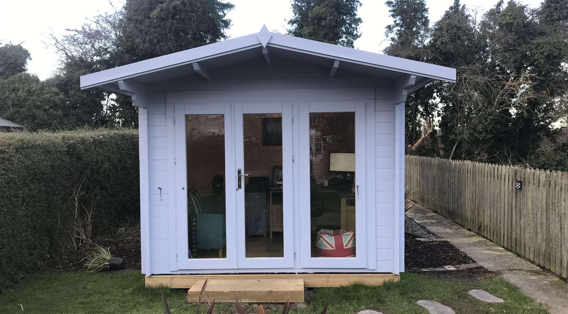 Karen and her husband have matching garden offices