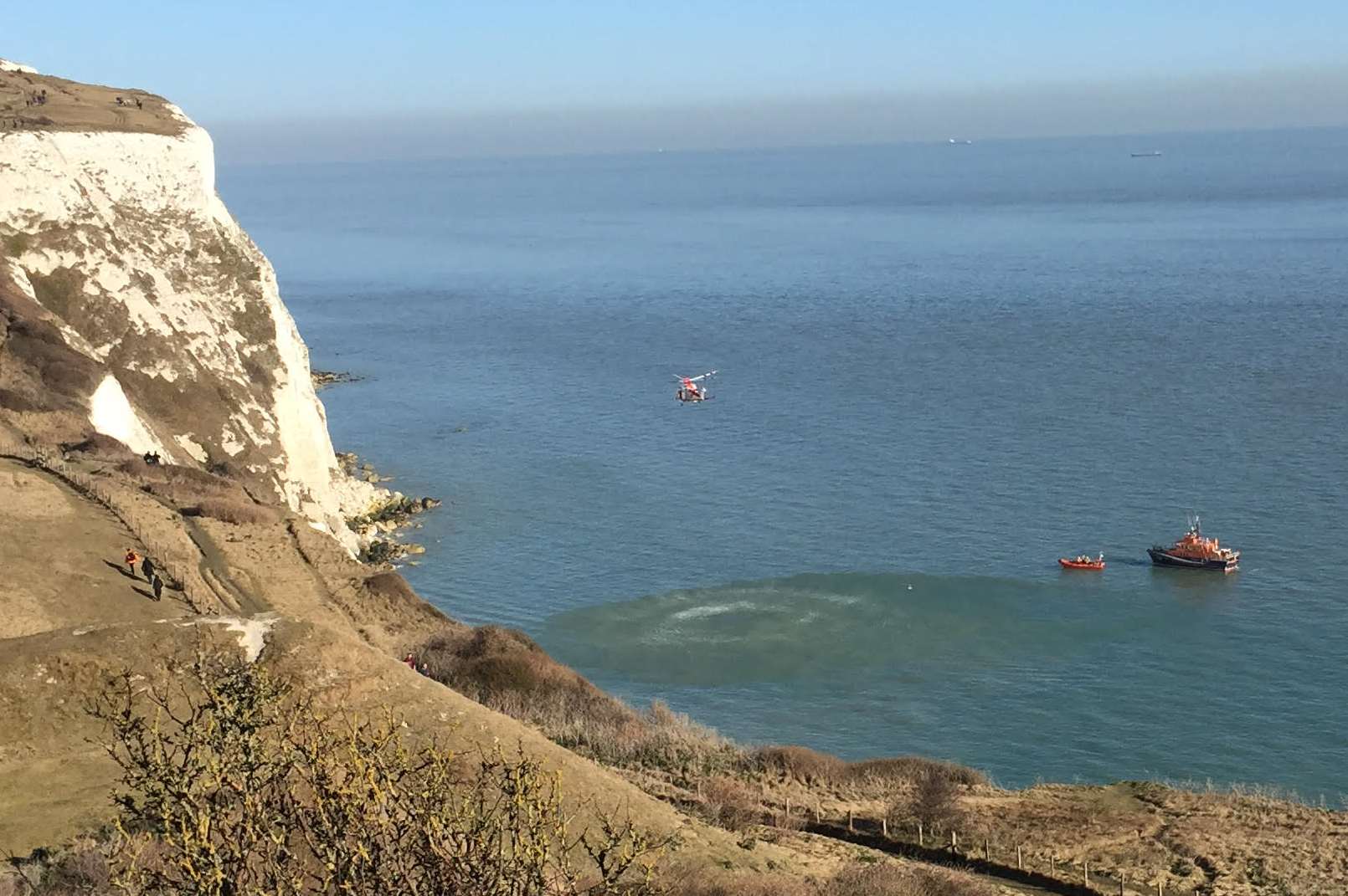 A helicopter and lifeboats seen during yesterday's tragedy. Picture courtesy of Gracie Irvine