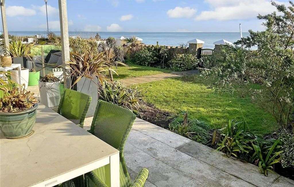 The garden has a terrace, lawns and spectacular views. Picture: Fine and Country