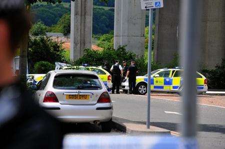 Police at the scene of the incident in The Medway Valley Park after a man fell from the Medway Bridge