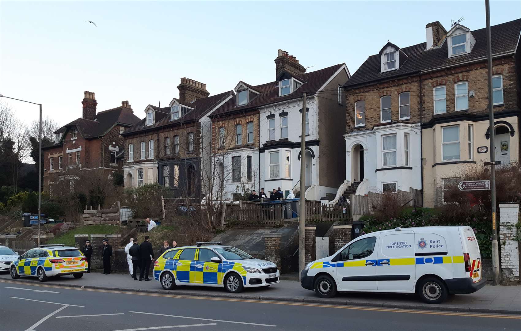 Police and forensic officers were spotted outside the house