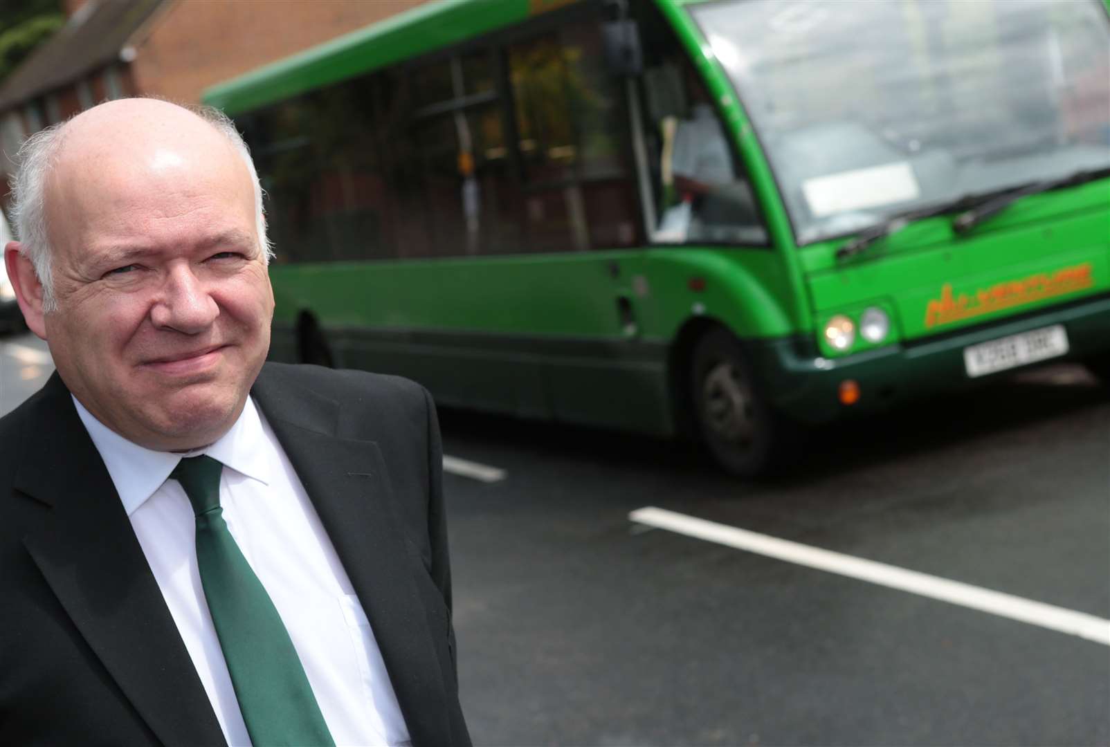 Bus boss Norman Kemp says a bus was also targeted.