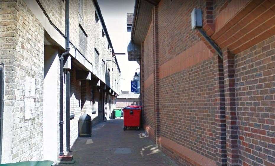 The man, in his 70s, was robbed while walking down Taylor's Passage in Ashford