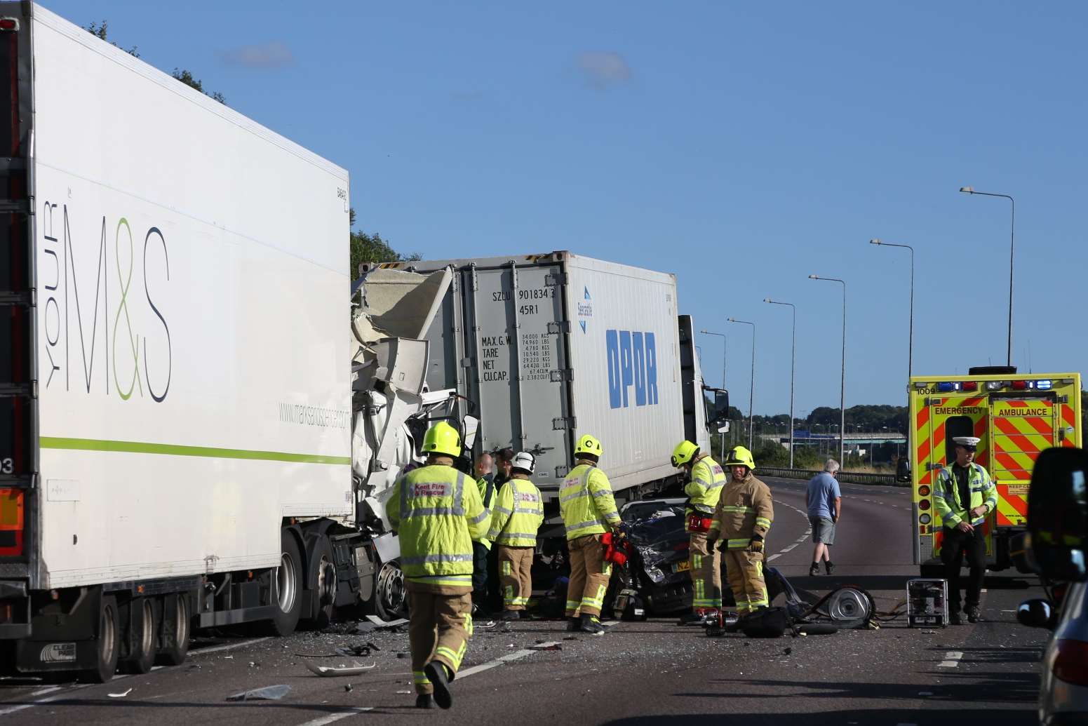 Fire crews at the scene of the fatal crash on the M2. Picture: Andy James/photo3.co.uk