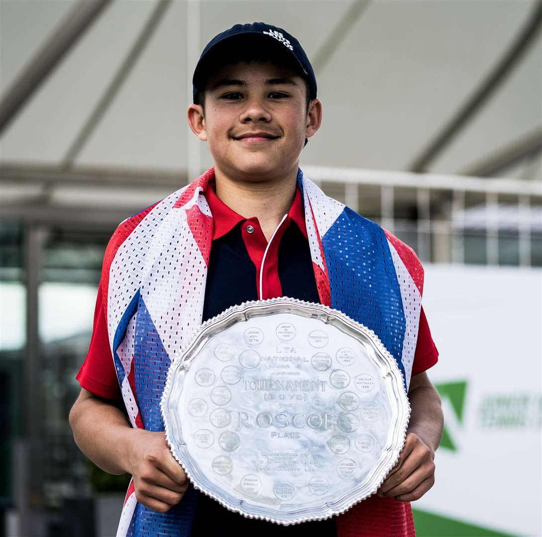 Canterbury's Benjamin Gusic-Wan with his trophy after winning the LTA Junior National Championships boys' under-16s singles Final