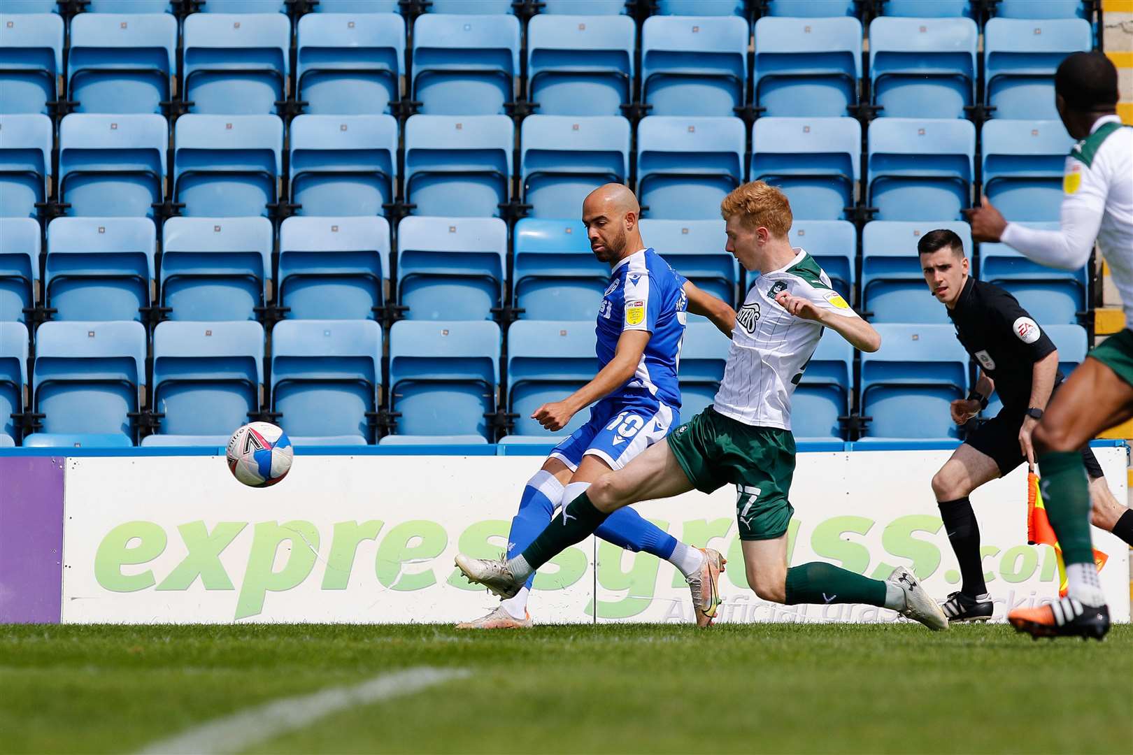 Ryan Law on defensive duty for Plymouth against the Gills Picture: Andy Jones