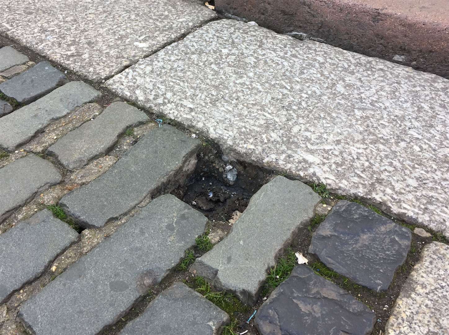 KentOnline visited the site near Canterbury Cathedral, where the cobblestone was missing