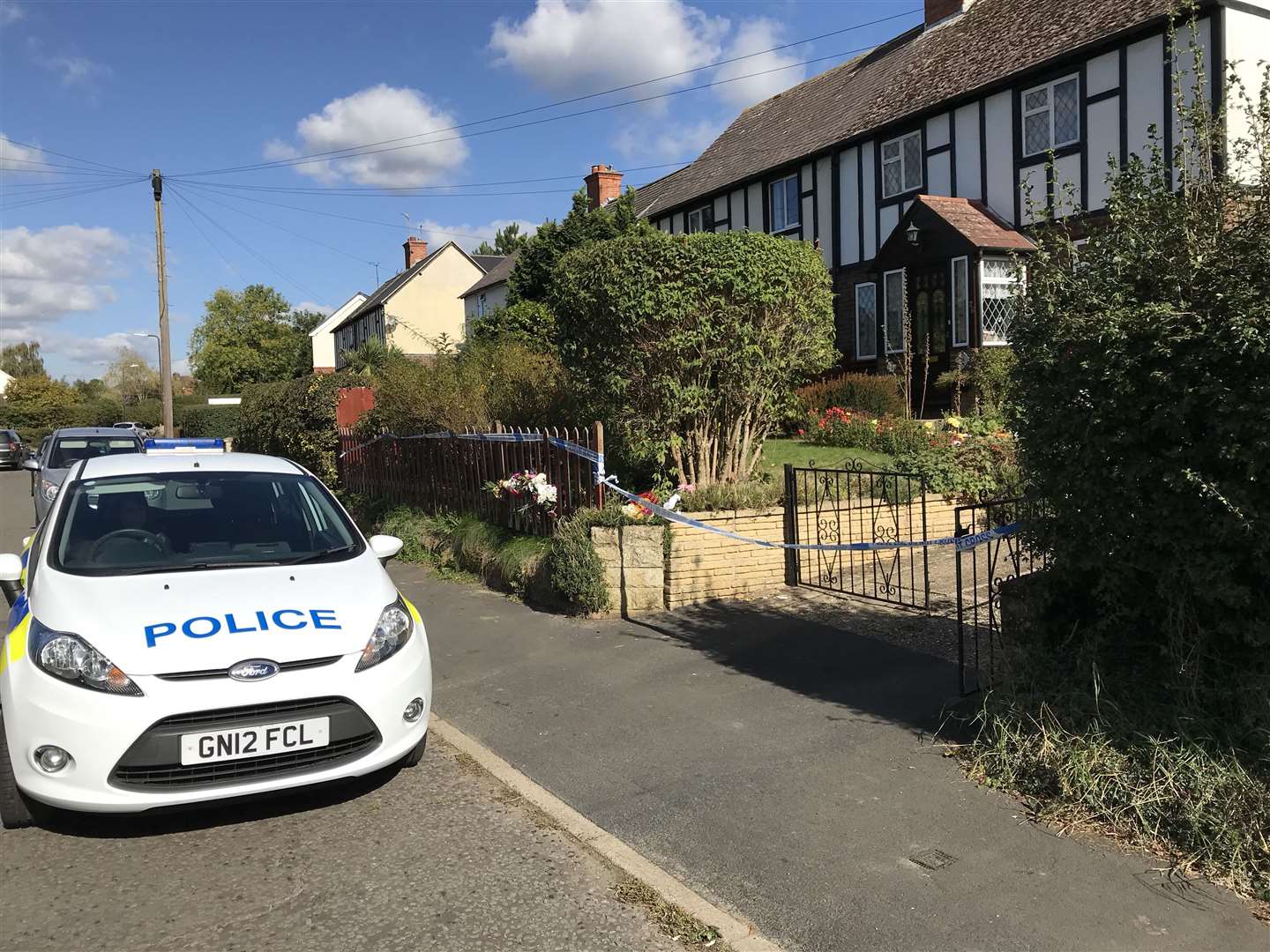 A police cordon remained in place at the murder house in Carpenters Lane on Monday (5476050)