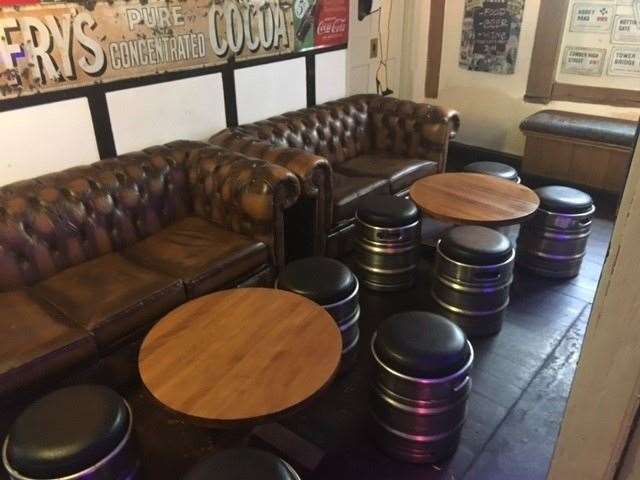 At the back of the pub there is a separate seating area with large sofas and stools created from old barrels