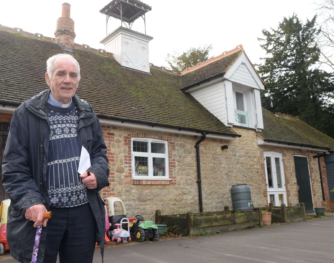 Father Peter Soper in front of the parish centre and pre-school at St Thomas More Church West Malling. Picture: Chris Davey