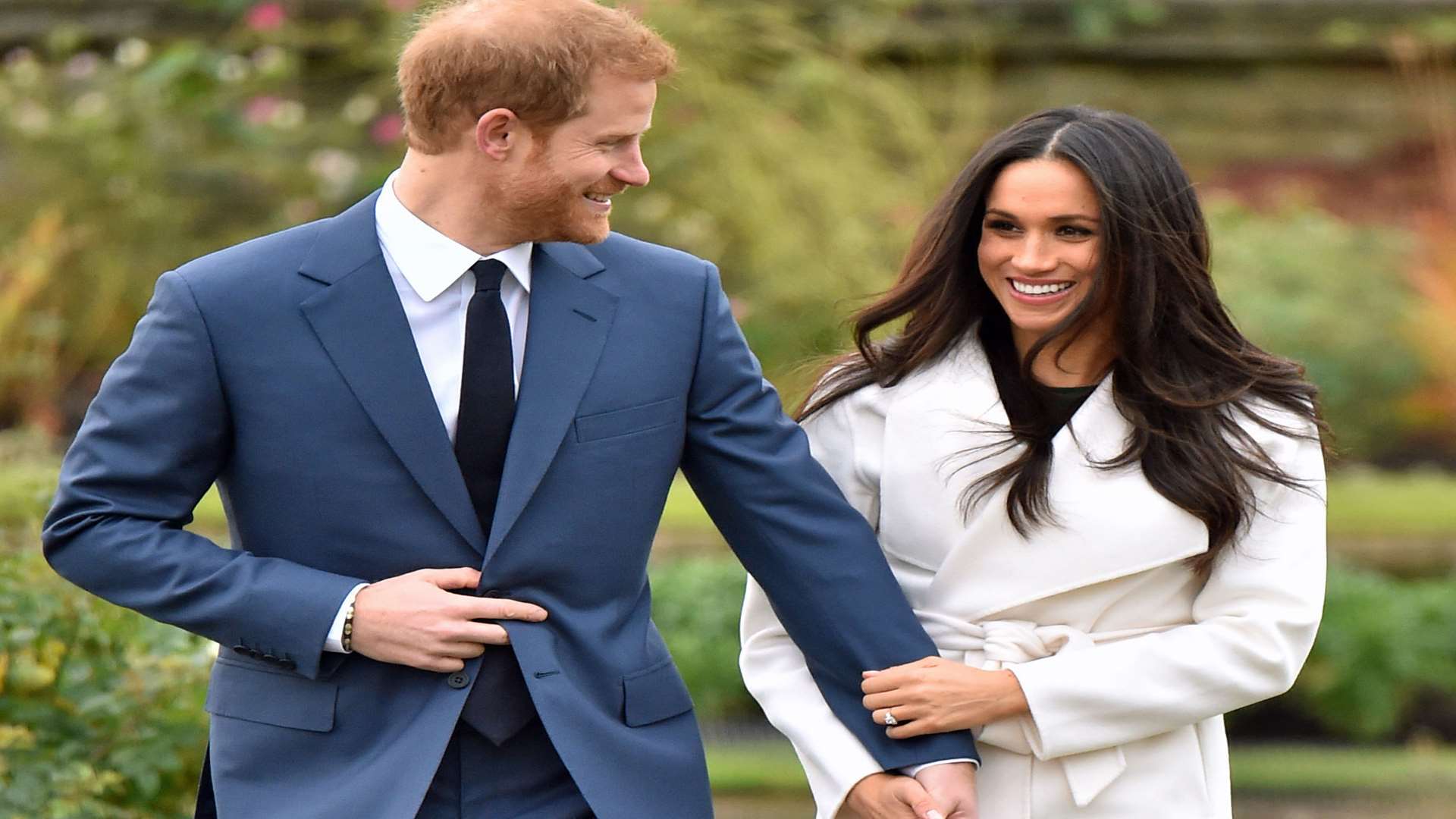 Prince Harry and Meghan Markle in the Sunken Garden at Kensington Palace, London, after the announcement of their engagement