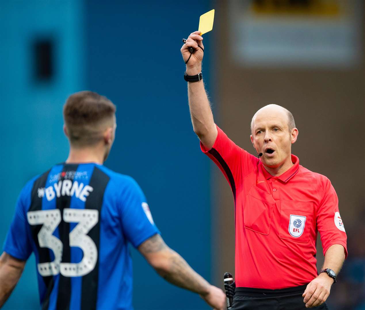 Referee Nick Kinseley shows Mark Byrne a yellow card. Picture: Ady Kerry