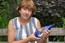 Author Karen Liebreich with the bottle