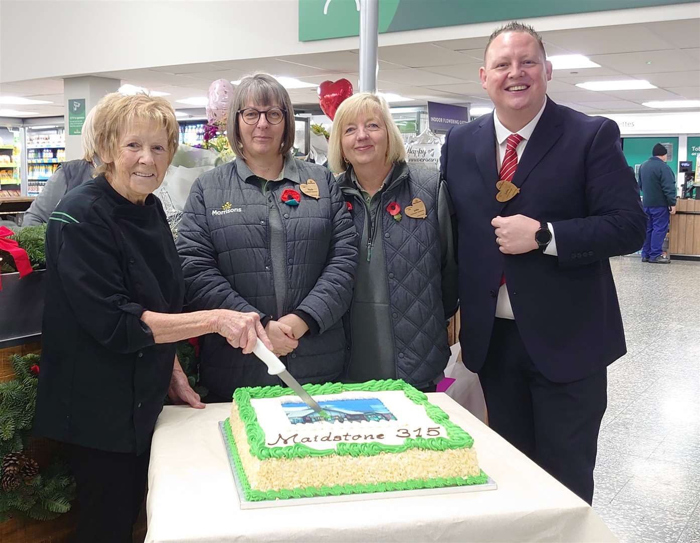 Three of the longest-serving staff members took part in the official reopening