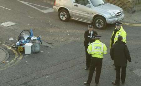 Police officers at the scene of the collision. Picture: ANDY PAYTON