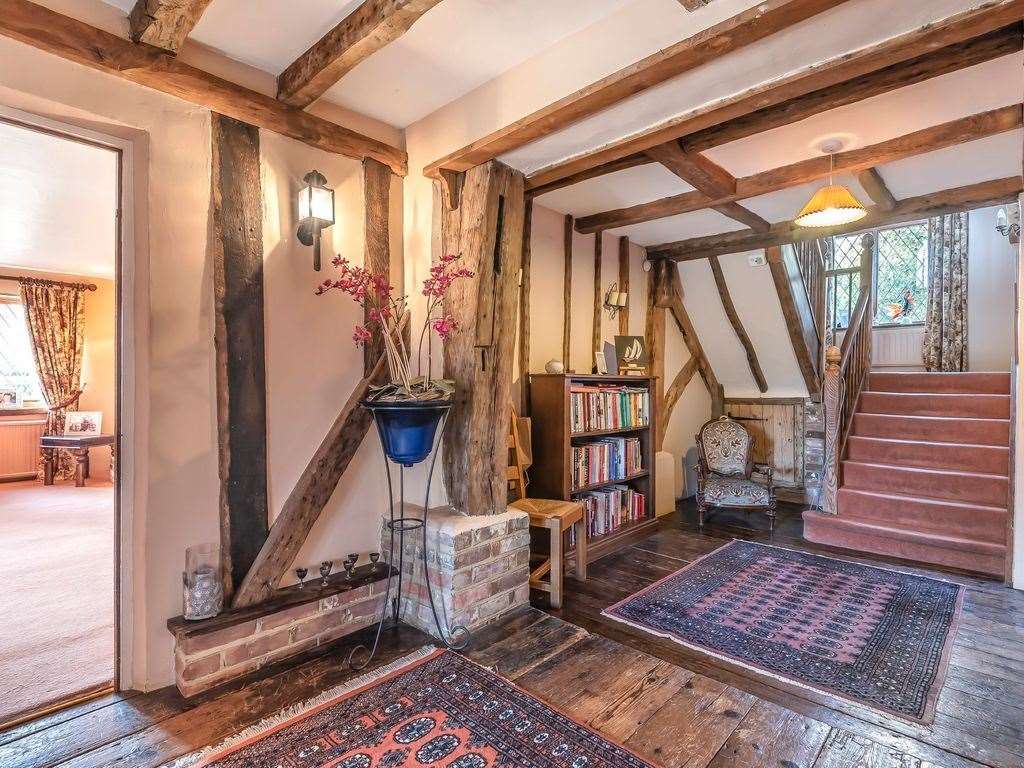 Exposed timber and brickwork feature throughout the 5-bedroom oast. Photo: Zoopla