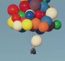 Adventurer Jonathan Trappe crosses the Channel flying helium balloons!