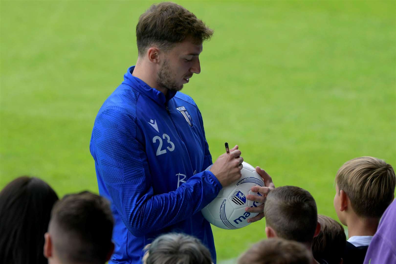 Conor Masterson signs a ball for a fan Picture: Barry Goodwin