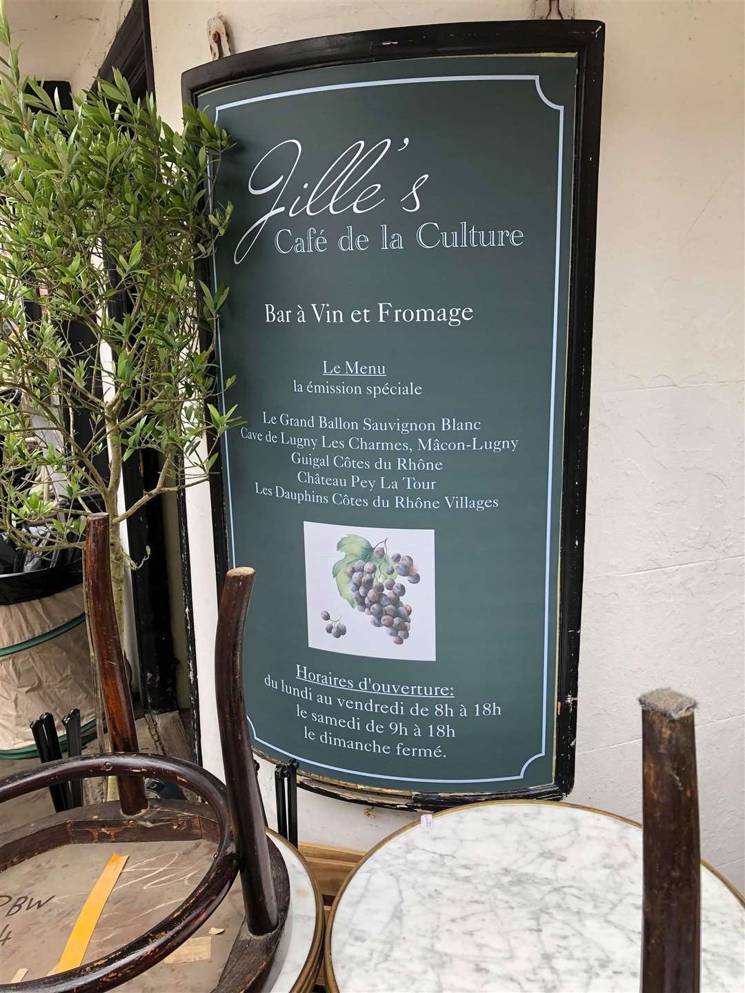 The Fruit Bowl sign has been covered over with a menu for a French restaurant