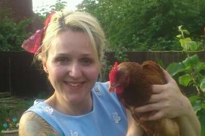 Ethel Welpeck, the World Cup Predictin’ Psychic Chicken, with kmfm Breakfast presenter, Emma Adam