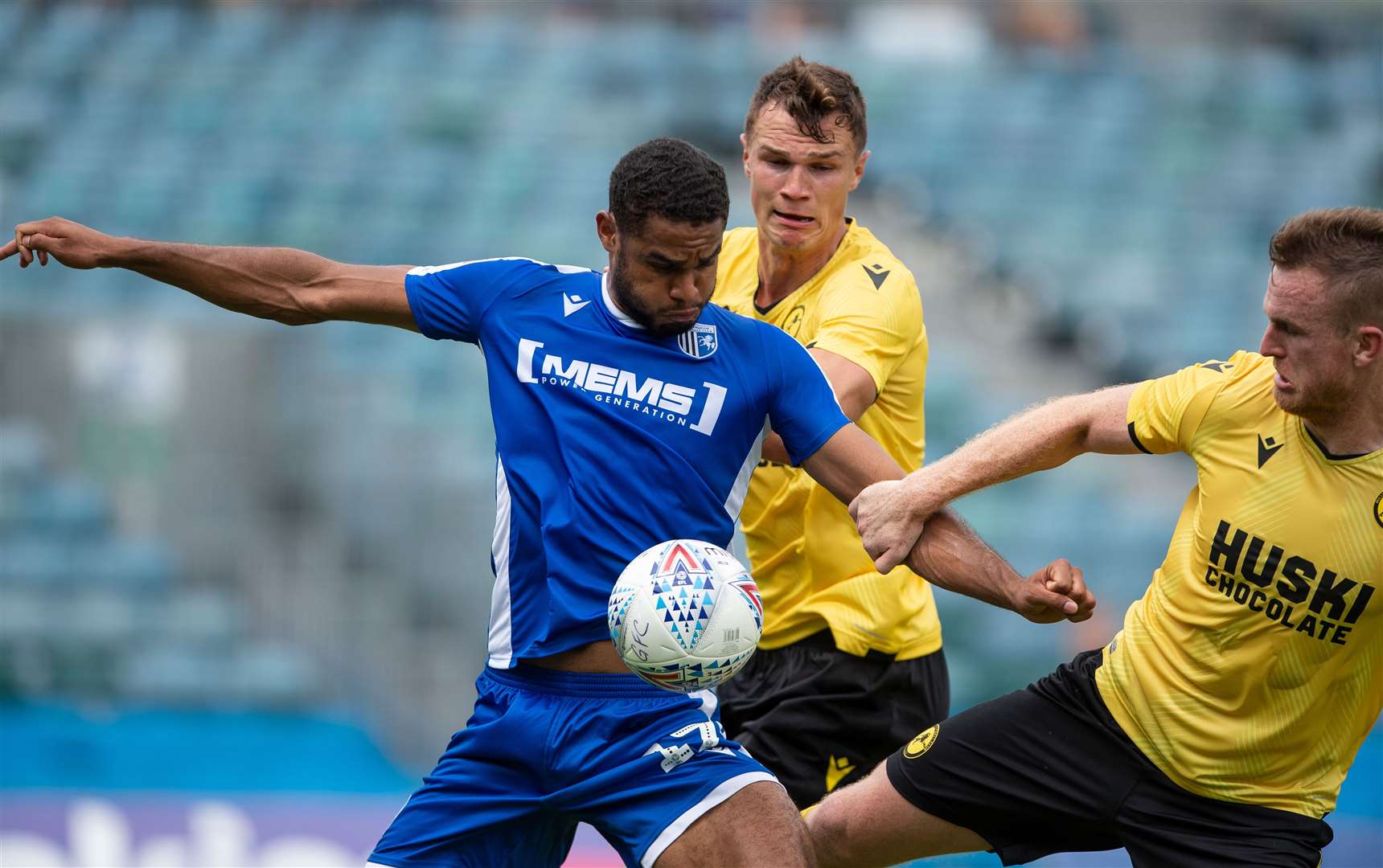 Mikael Mandron in the thick of the action for Gillingham against Millwall Picture: Ady Kerry