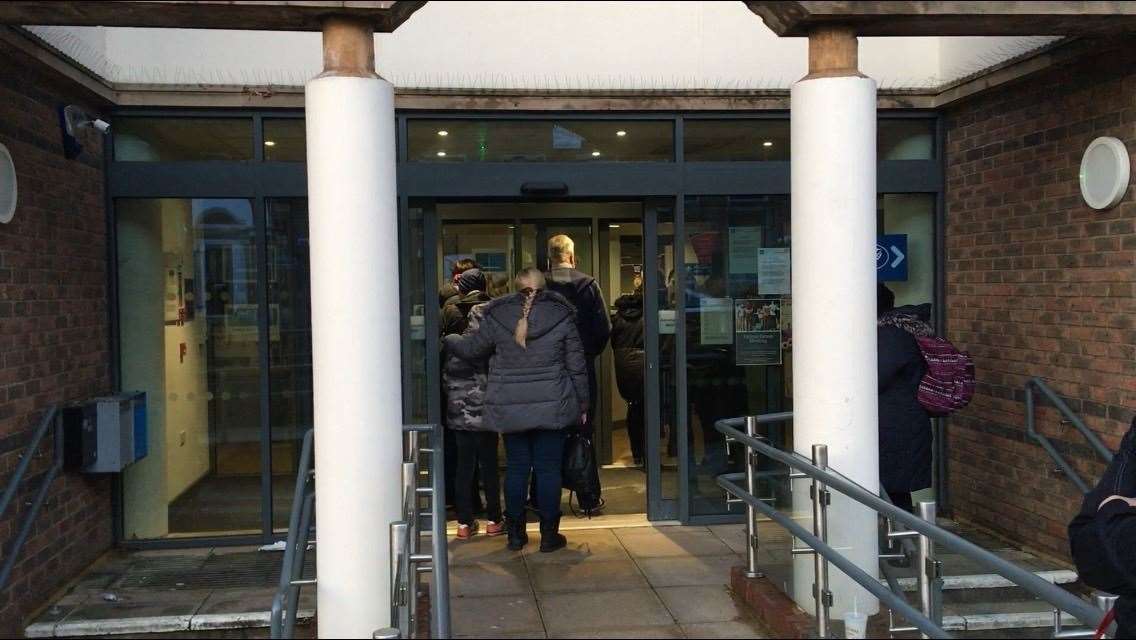 Patients queuing outside Albion Place Medical Practice, Maidstone, pictured in 2019