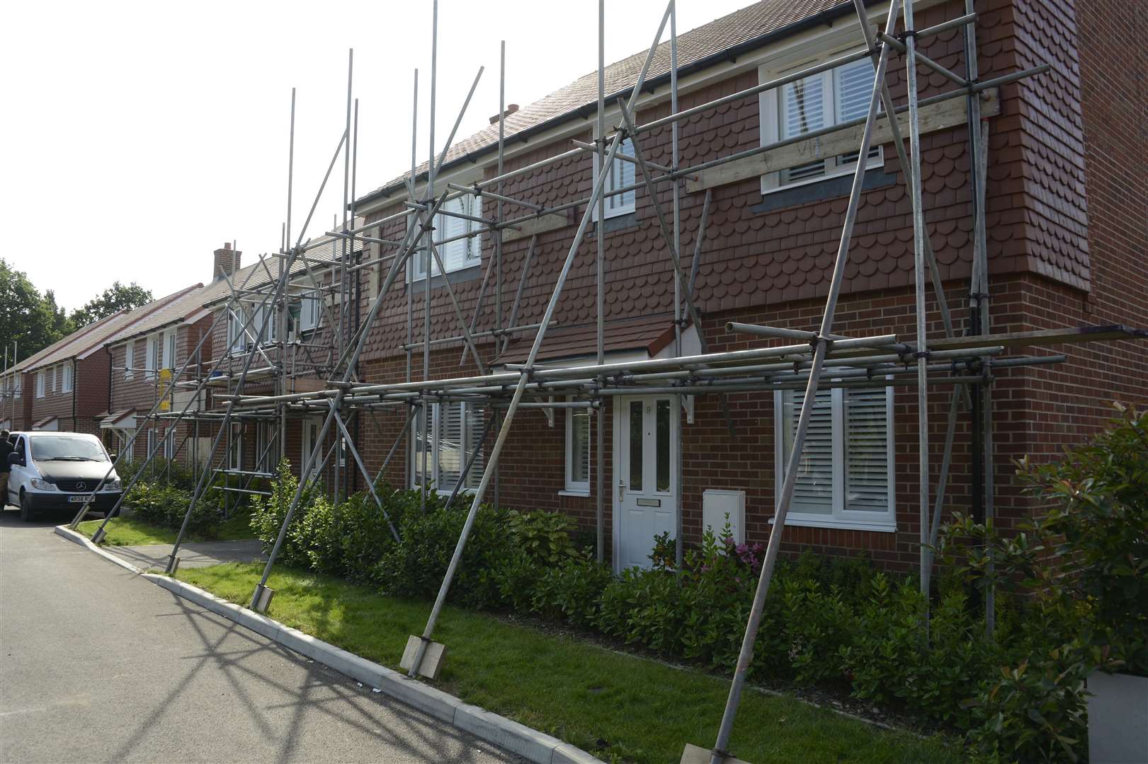 Scaffolding has been put up on seven homes in Limes Place. Picture: Paul Amos