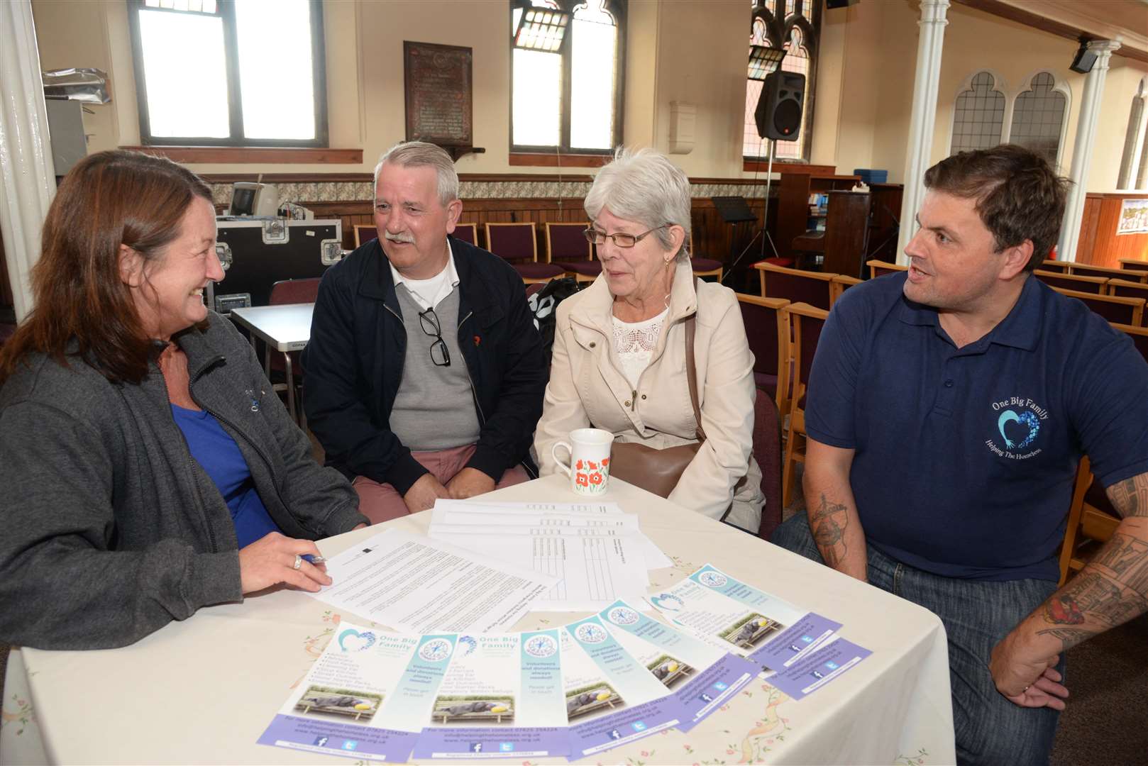 Elizabeth Shaw, left and Darren Shaw, right chat with David and Patricia Melbourne at the One Big Family volunteers event. Picture: Chris Davey... (4918396)